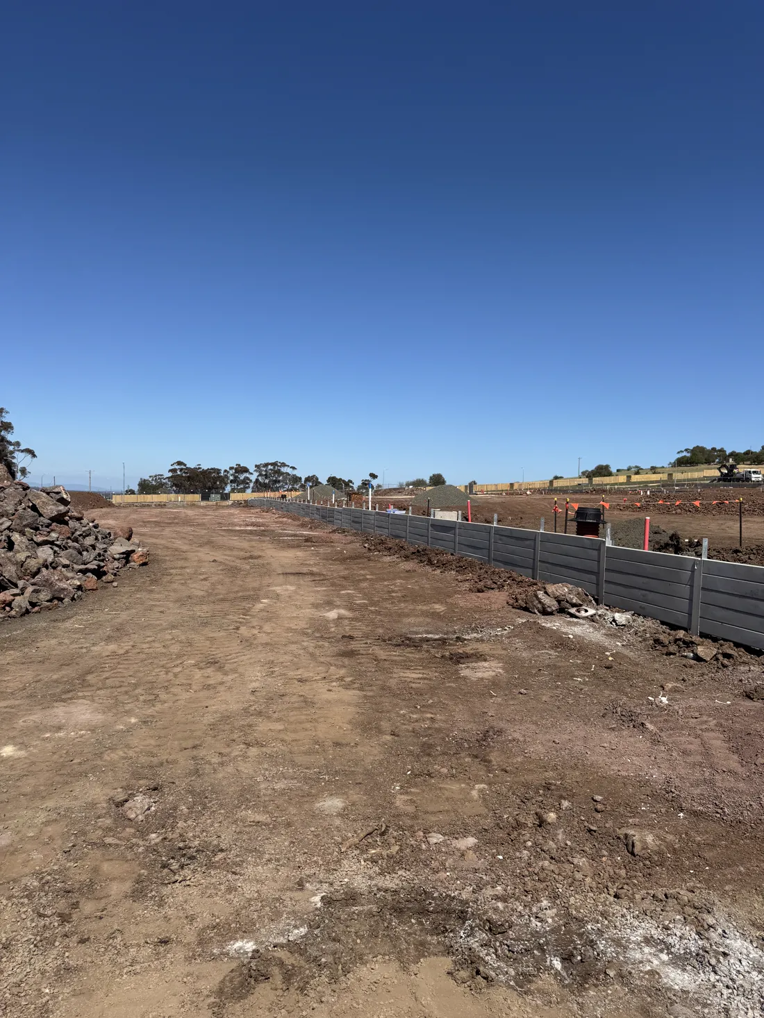 Dark sleeper retaining wall on a commercial site